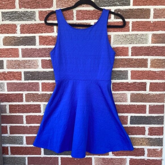 Royal blue sleeveless dress with a V in the back. Size is a small. - Picture 1 of 3